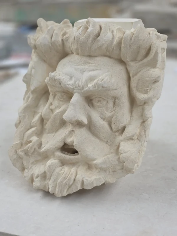hand crafted stone face