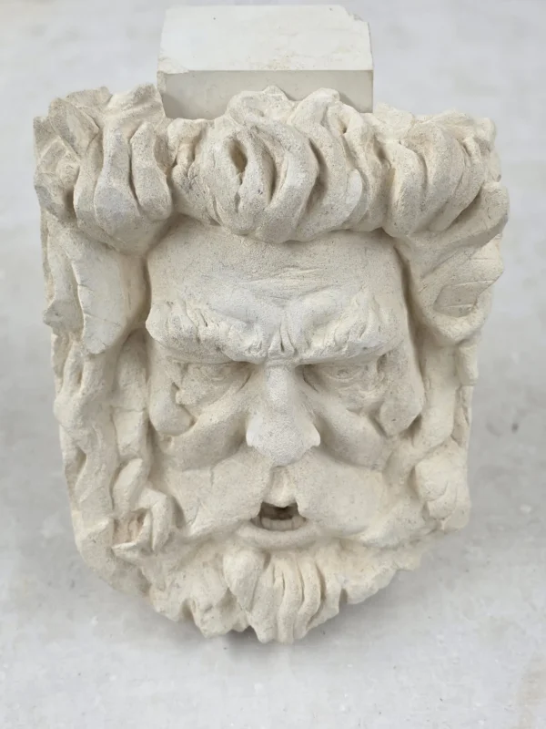 hand crafted stone face