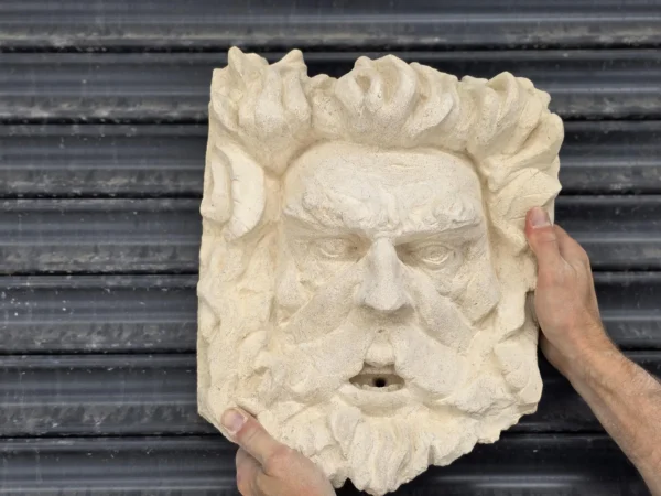 hand crafted stone face