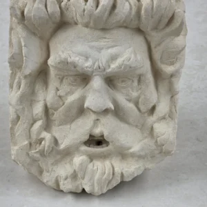 hand crafted stone face