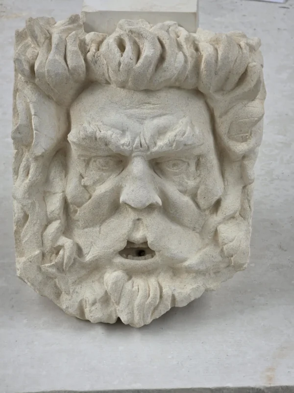 hand crafted stone face